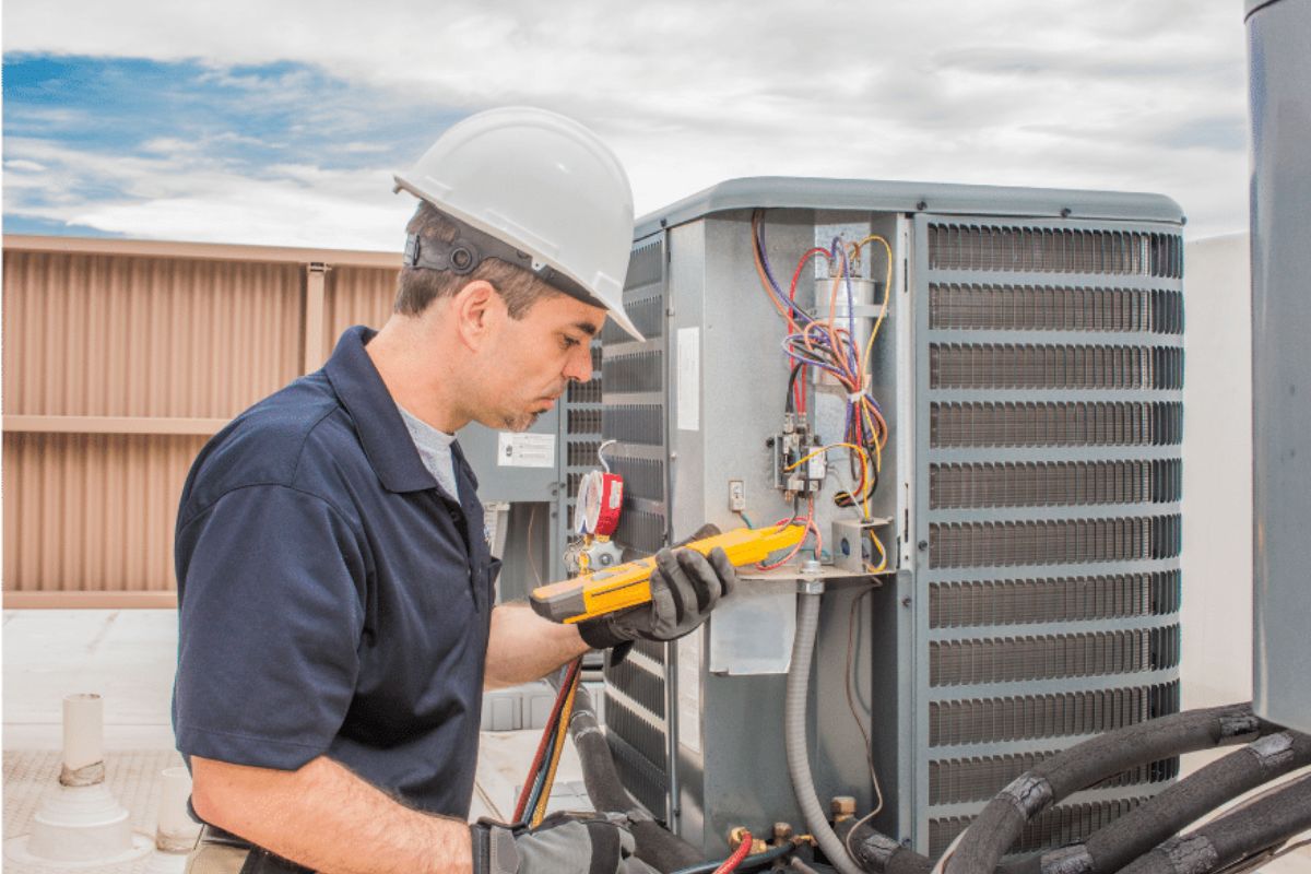 Picture of an HVAC technician.