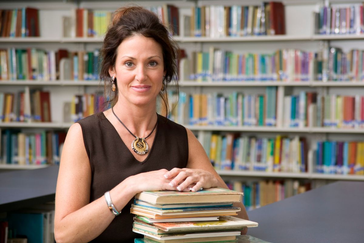 Image of a librarian and books.