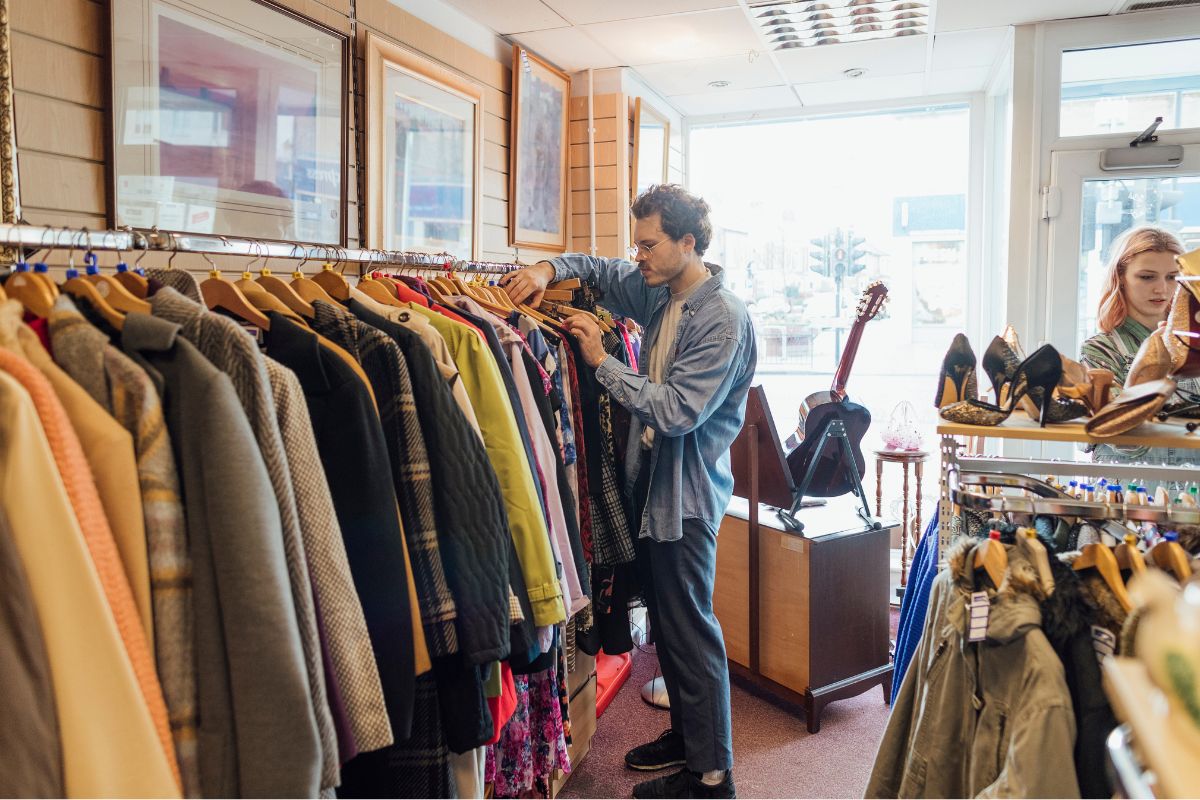 Image of a man shopping for clothes.