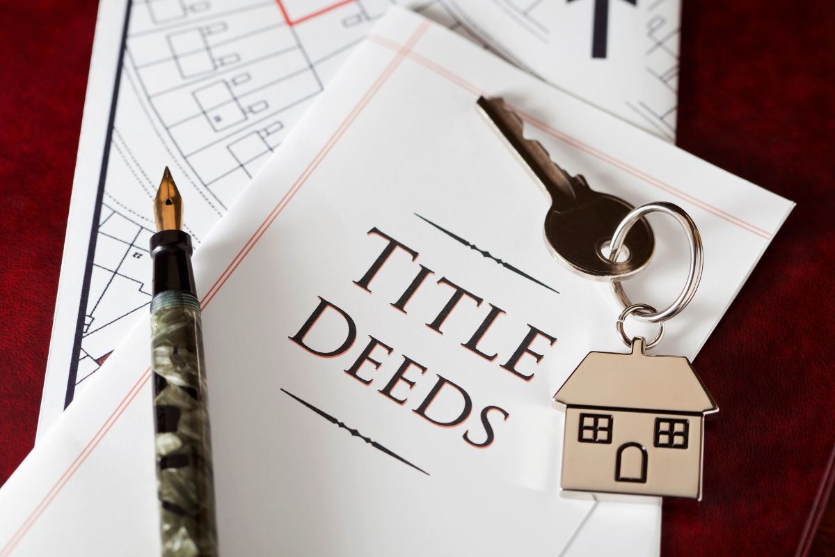 The picture shows a paper with title deeds wording.