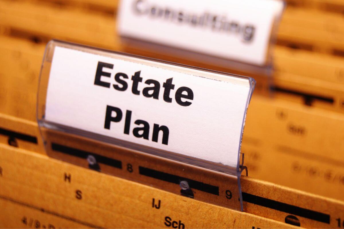 The image tells about brown folders with a tag and notes on them referring to keeping your estate plan updated regularly to ensure it reflects any changes in your life and also allows you to adjust for changes in tax laws or financial situations.