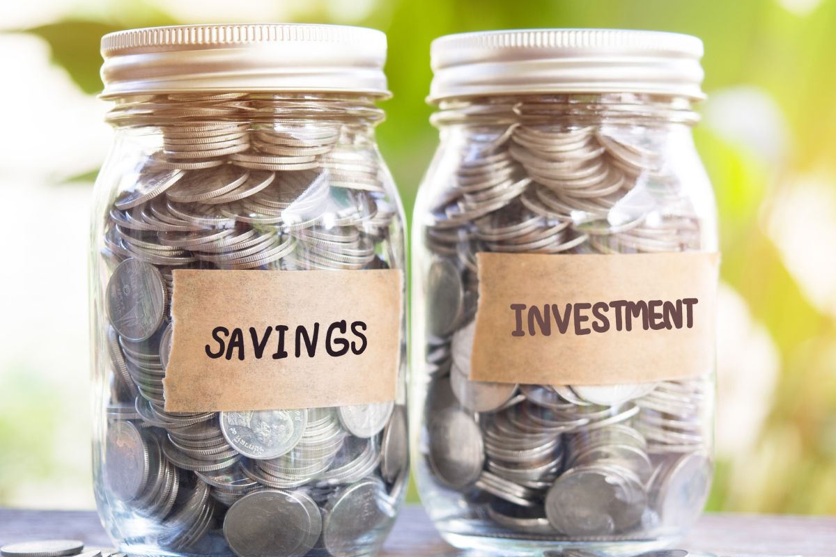 The picture shows jars of savings and investment money.