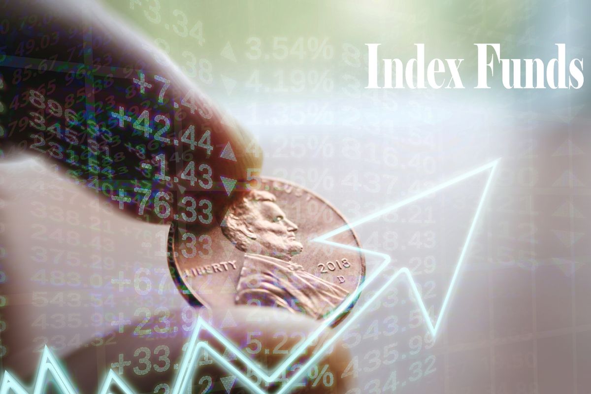 Image of a man's hand investing in index funds.