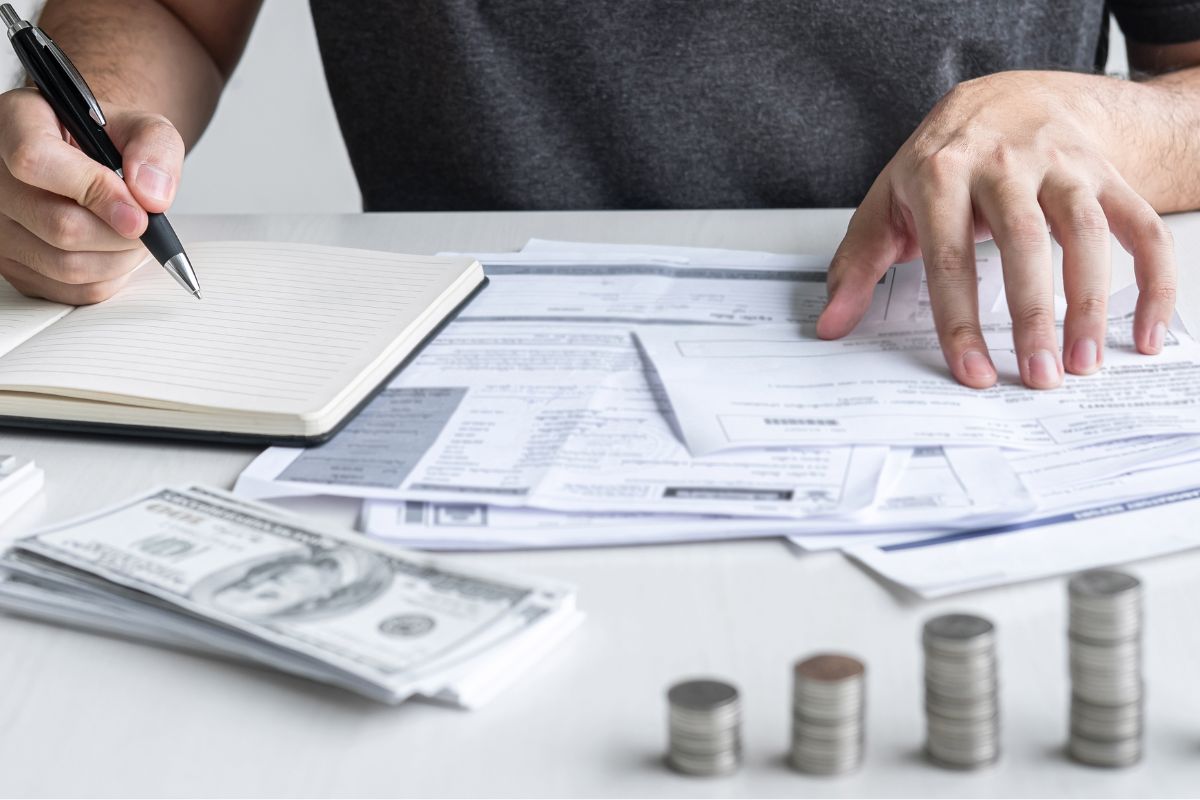 Picture of a man reducing his living expenses.