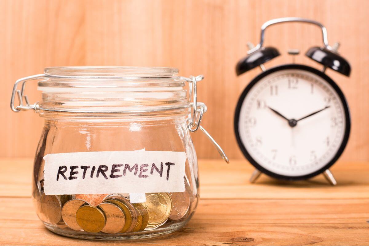 The picture shows a clock and a jar filled with coins and a note indicating to start saving for retirement which brings them closer to financial independence.