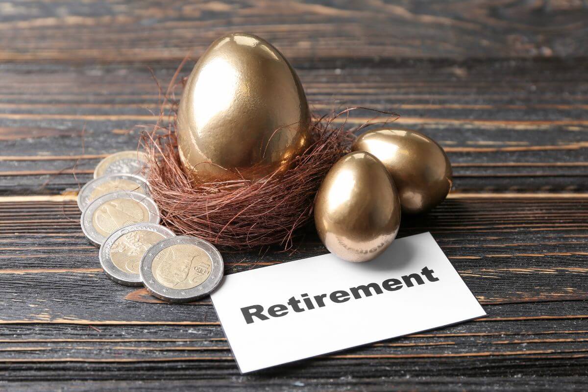 The photo of coins golden eggs, a nest, and a piece of paper with a note referring to a good-sized nest egg for retirement which depends on your lifestyle and monthly expenses.