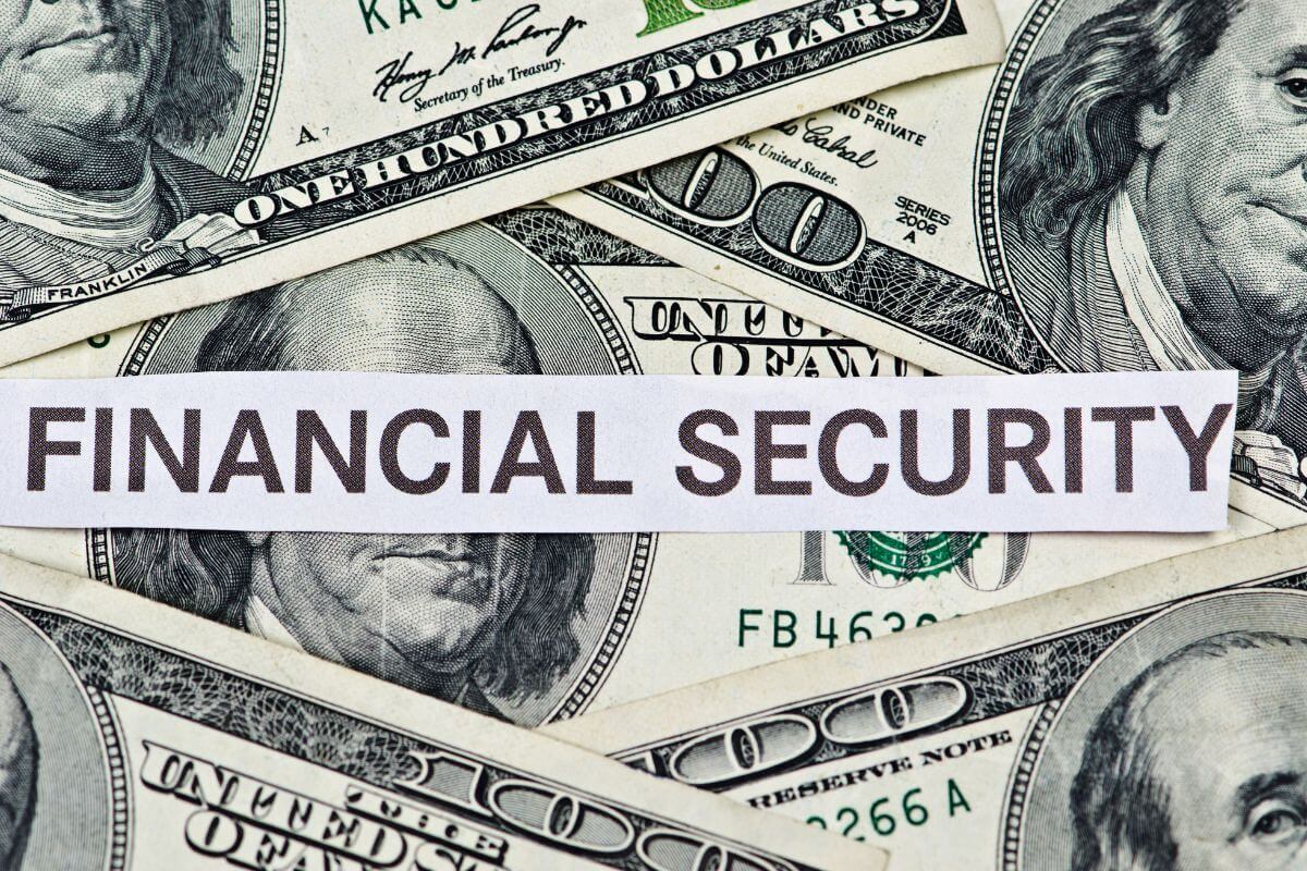 The image tells about dollar bills and a piece of paper with notes indicating the importance of having a nest egg saving for the future and giving you confidence and stability.