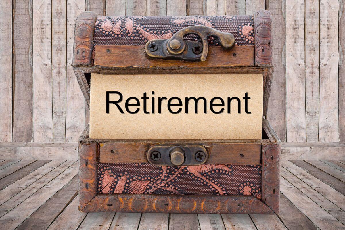 The image of a treasure chest with a piece of paper with a note indicating to drag on your retirement portfolio helps keep your retirement savings going as planned.