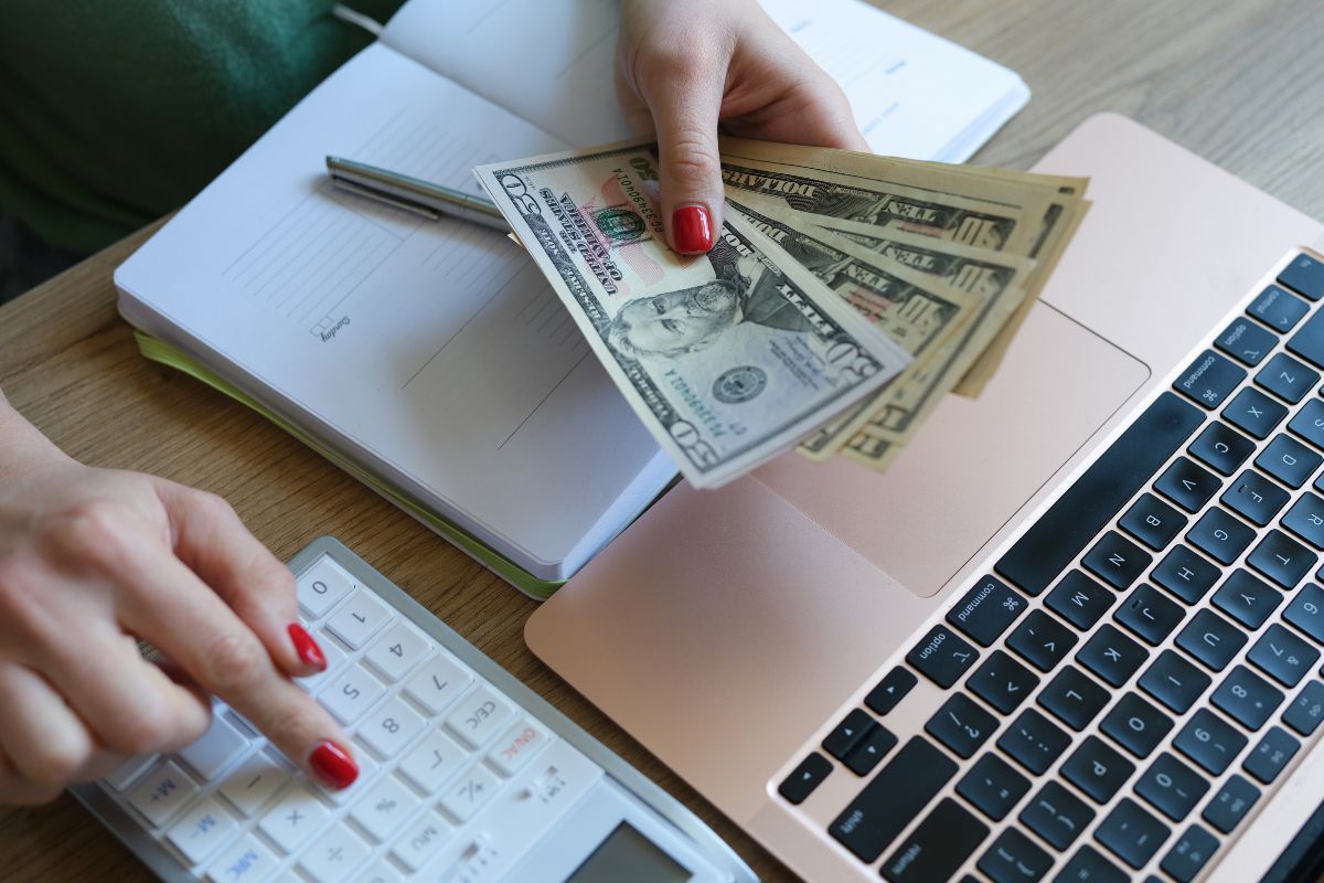 Picture of a woman's hand budgeting.
