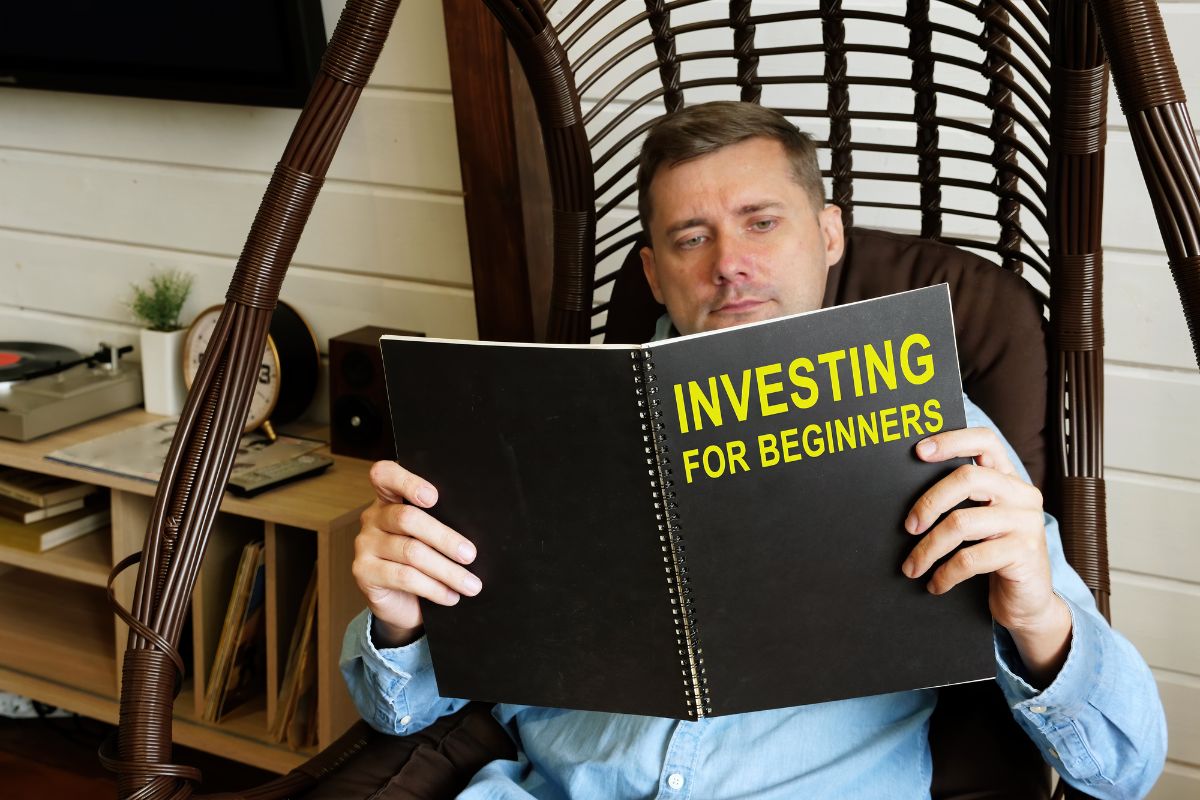 Image of a man learning investing for beginners.