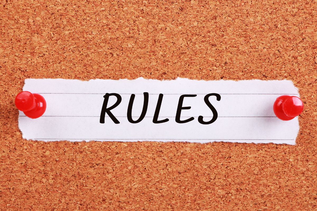 The photo shows a paper with rules written on it.