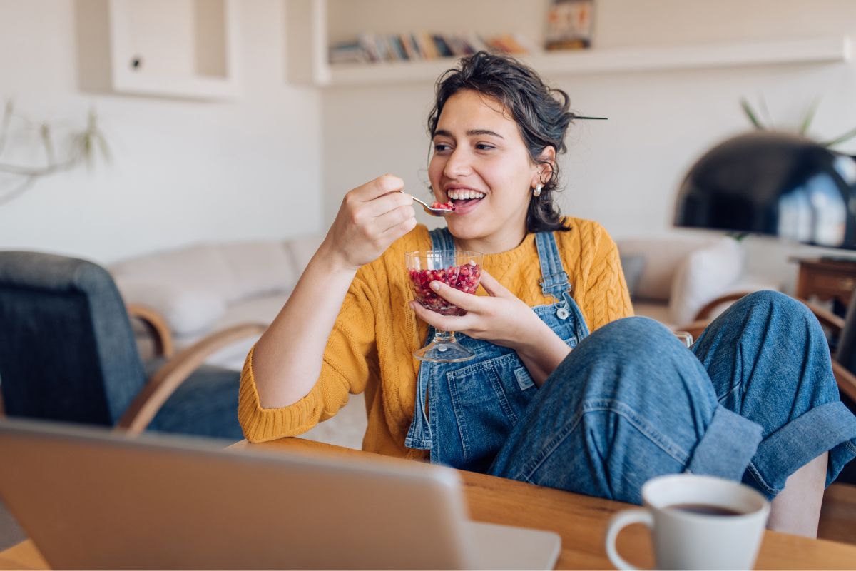 Photo of a woman eating.