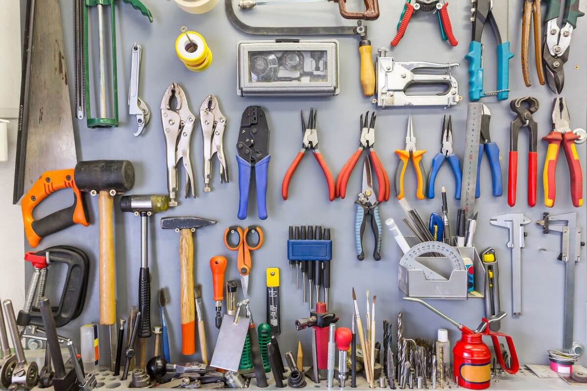 The photo of different varieties of tools means renting out equipment through sharing platforms to make your budget stretch further without selling things permanently.