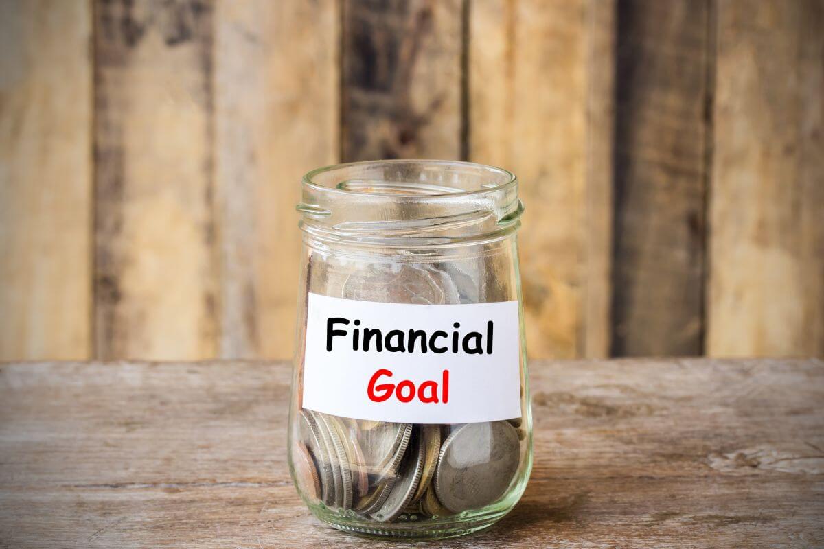 The image shows a jar field with coins and notes referring to setting short-term financial goals that help teens learn patience and the value of working towards something they want.