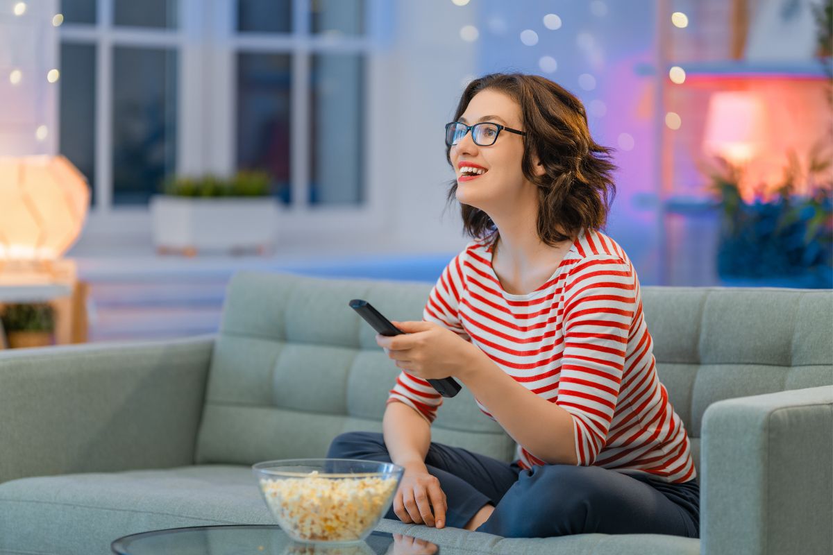 A woman watching a late-night infomercials.