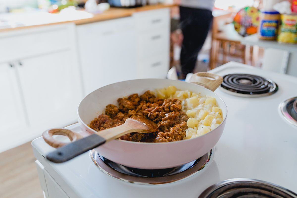 The photo shows cooking meals at home.