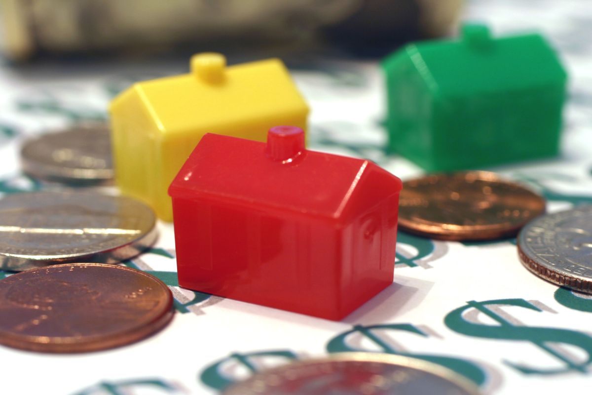 Image of monopoly board games with money.