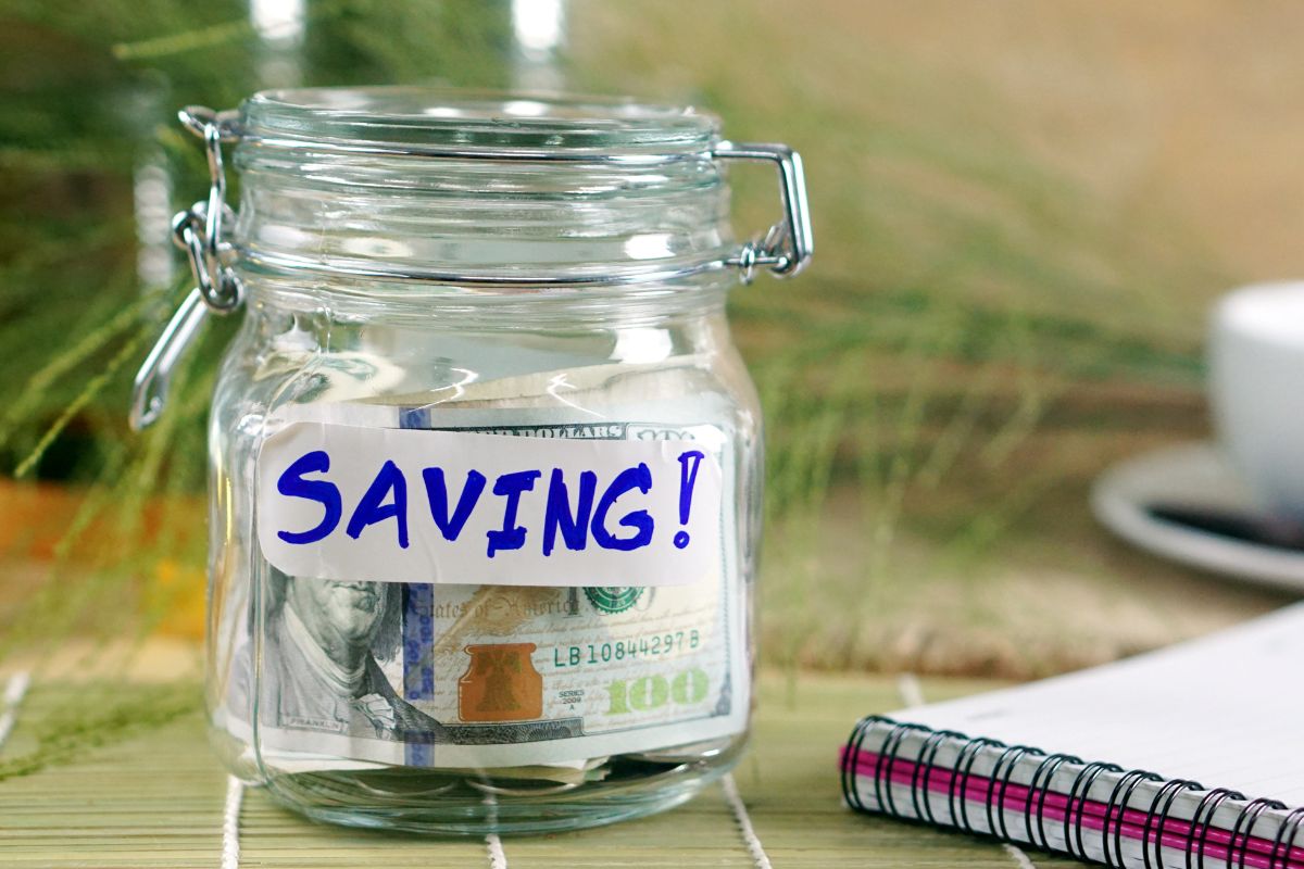 The photo shows a jar of savings.