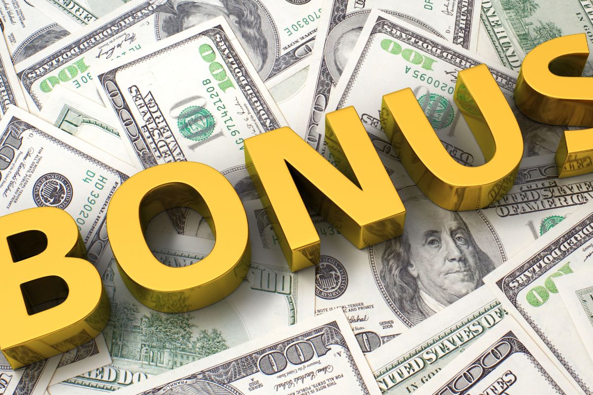 Picture of money and bonus wording.