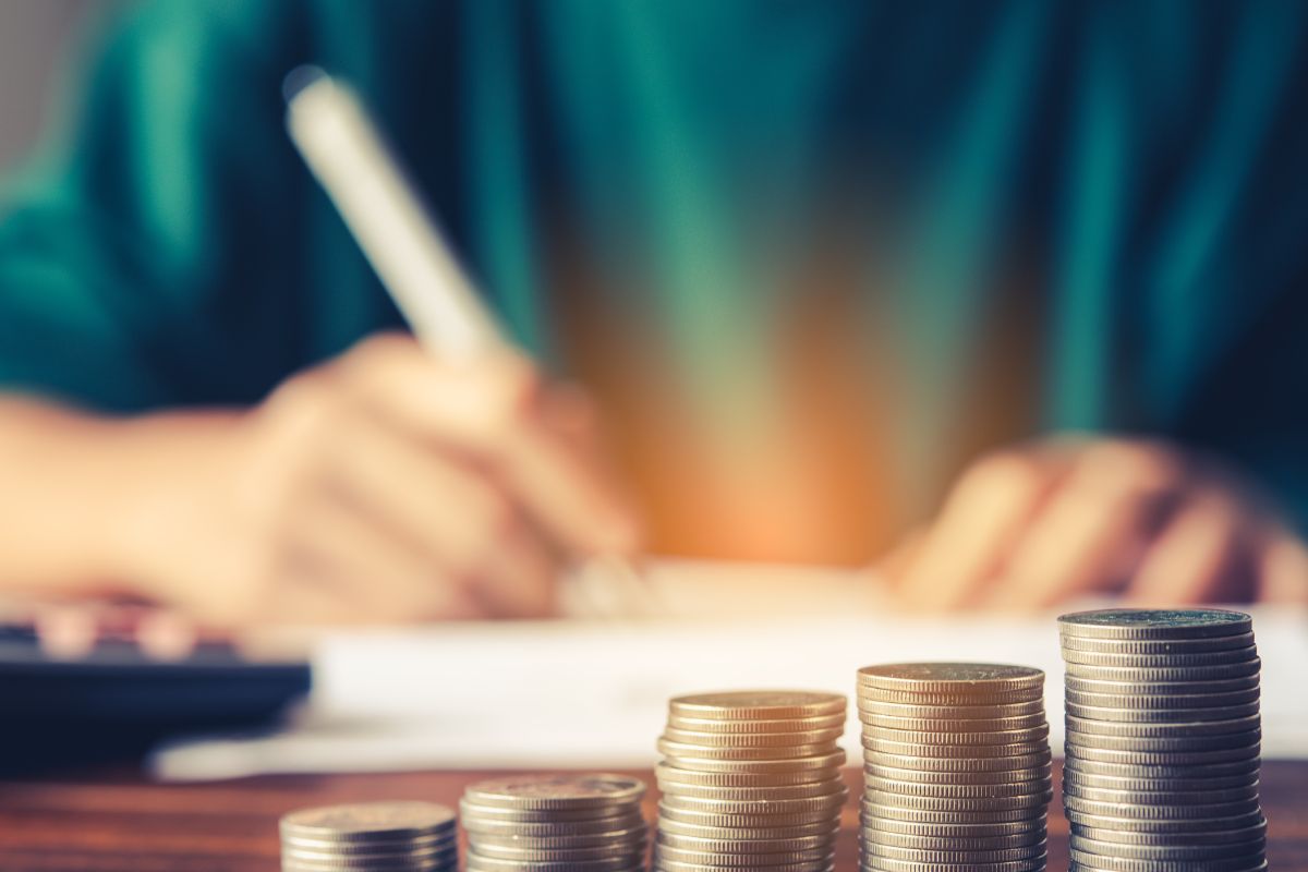 The picture of a woman creating a budget.