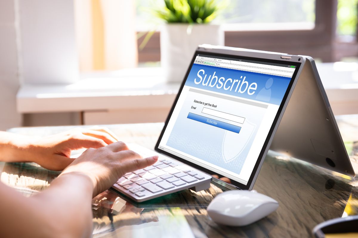 Photo of a woman's hand canceling subscription.
