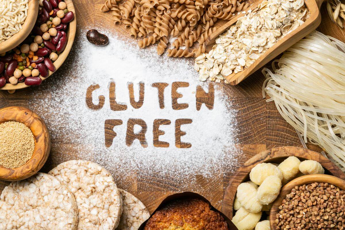 The image shows different types of pasta, grains, nuts, and notes at the table which means gluten-free products are priced much higher than regular versions, checking ingredient lists can help you decide if the price is worth it.