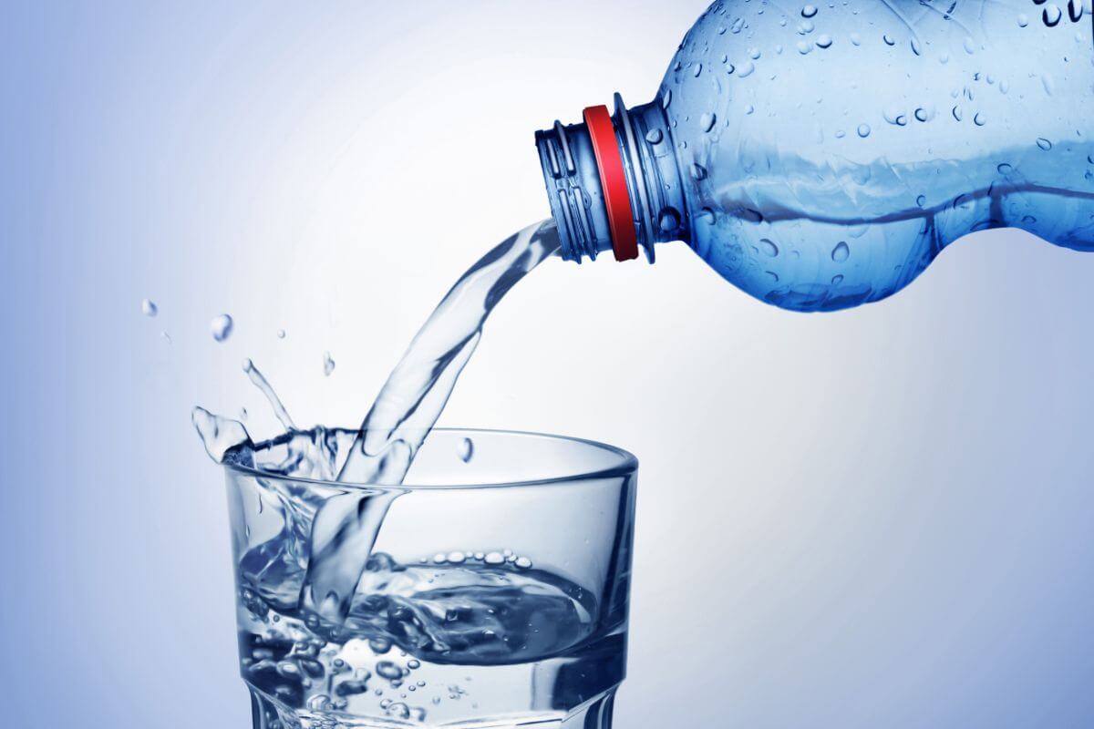 The picture tells about a bottle poured into the glass which means sparkling waters with added vitamins can be overpriced, and flavored water drops offer a much cheaper alternative.