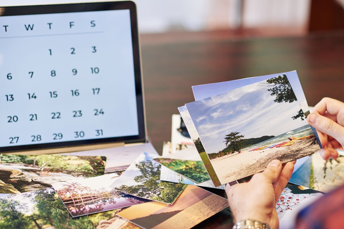 Image of a woman making a DIY photo calendar.