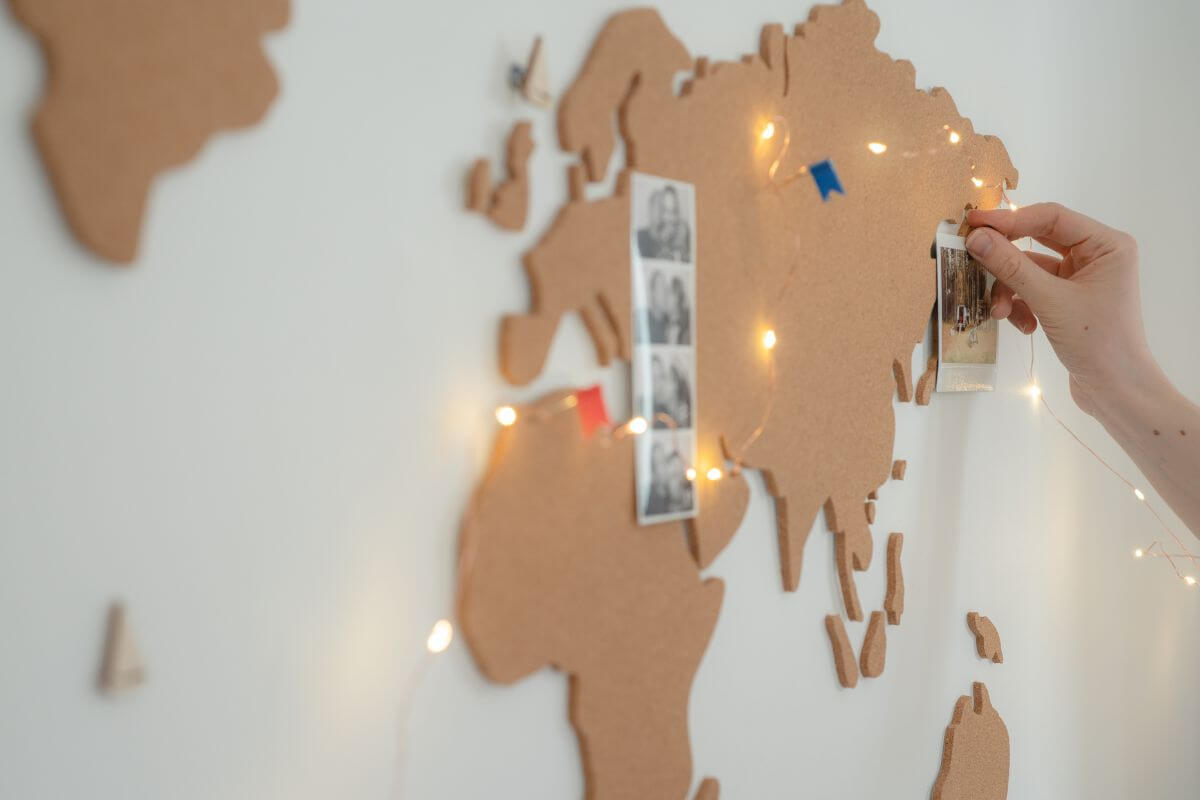 The picture shows a map on the wall with pictures and light referring to a personalized map of where you first met brings back great memories every time they look at it.