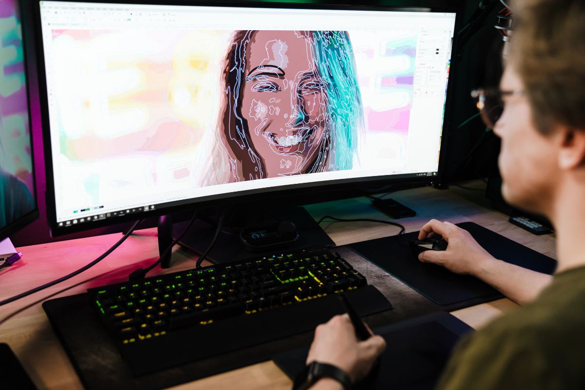 Picture of a man making a video montage.
