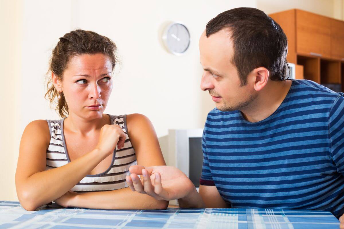 The picture shows a man asking a money from his partner which means relying on you financially without contributing equally can lead to resentment.