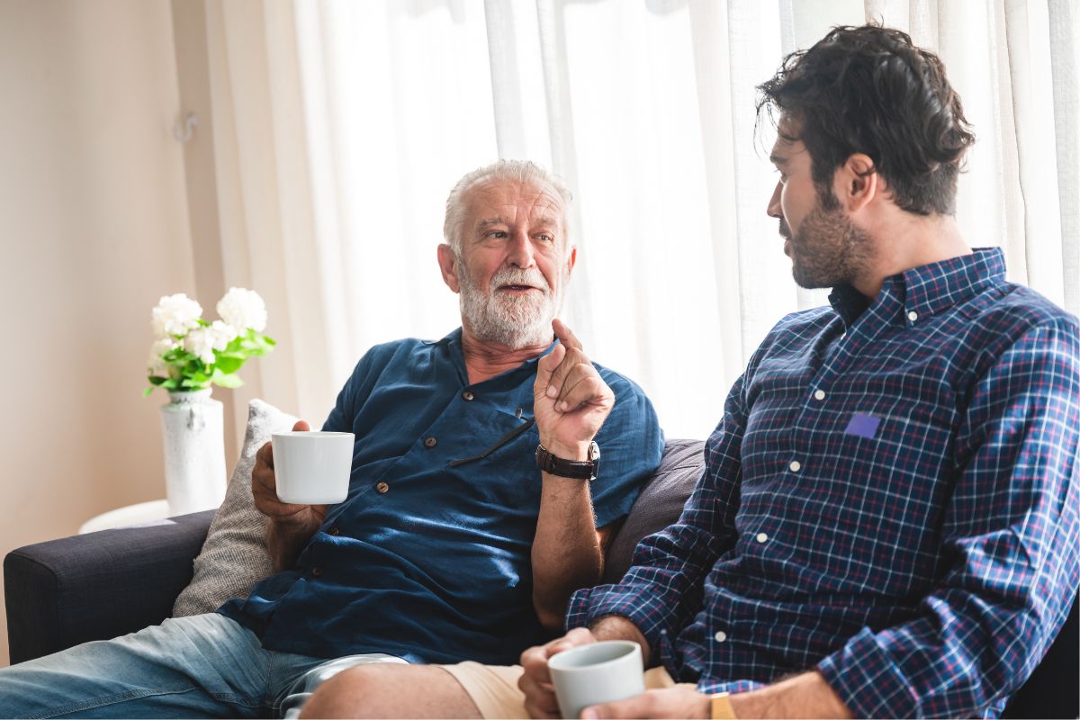 The photo shows the father and son conversation.