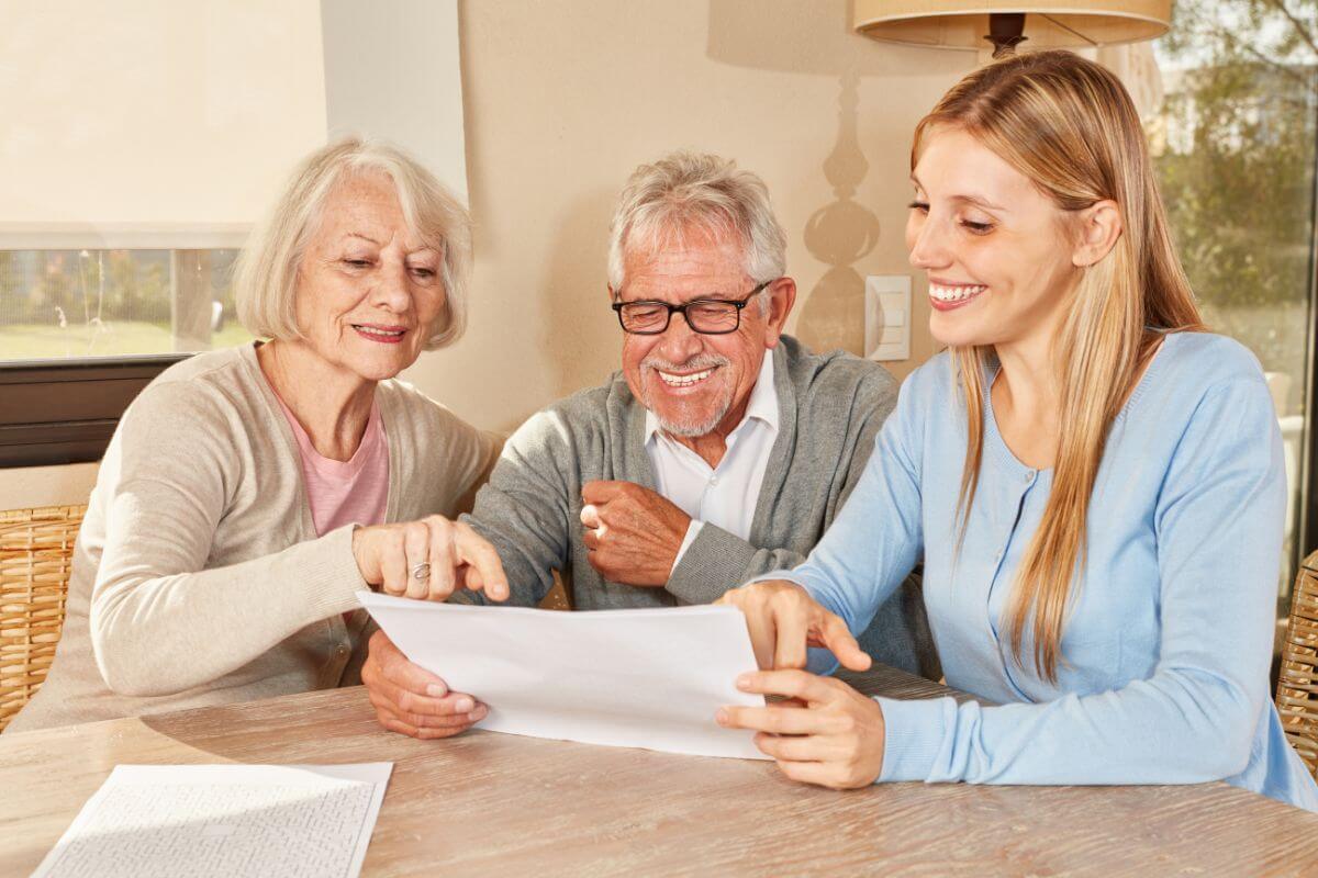 The photo shows a senior couple and their daughter explaining the papers which refers to starting today with helping your parents with their finances and reach their retirement goals.