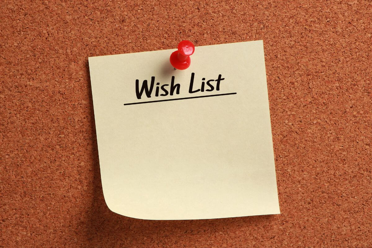 The image shows a piece of paper with a pin and noes referring to creating a wish list and waiting 30 days before buying it helps stop impulse buys and keep money in the bank.