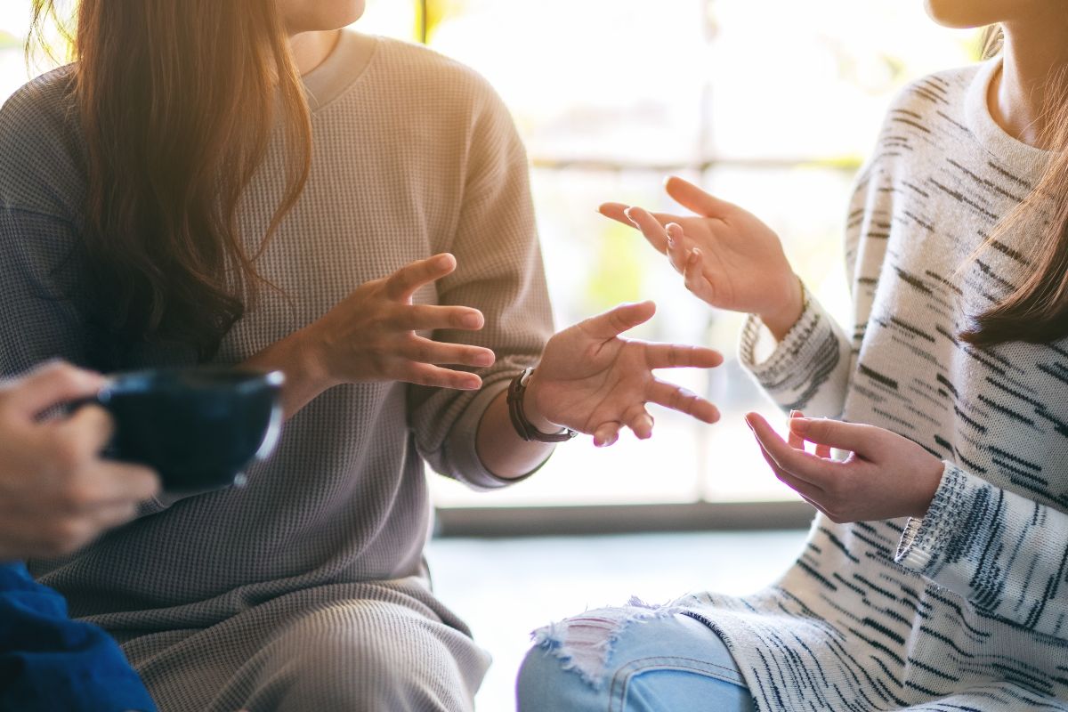 The picture shows women talking.