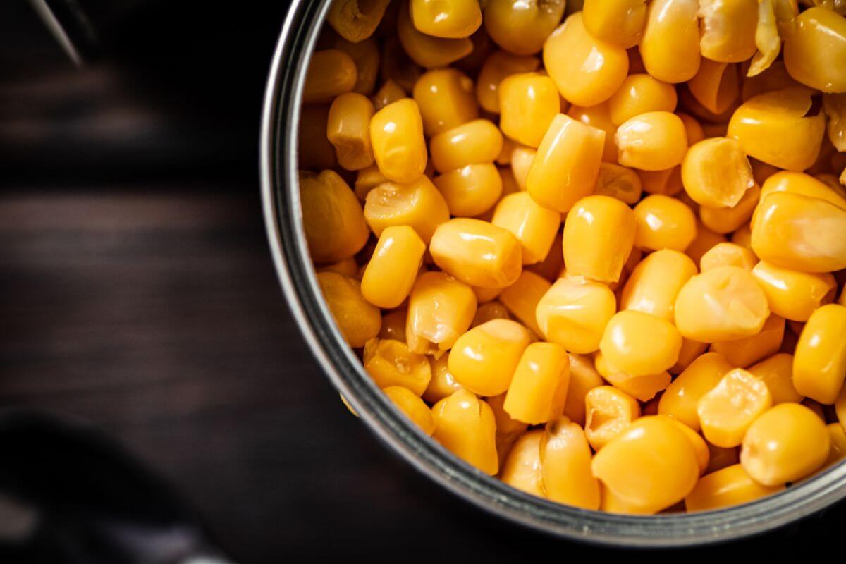The image shows canned vegetables and corn are an easy way to add nutrition to meals without worrying about spoilage.