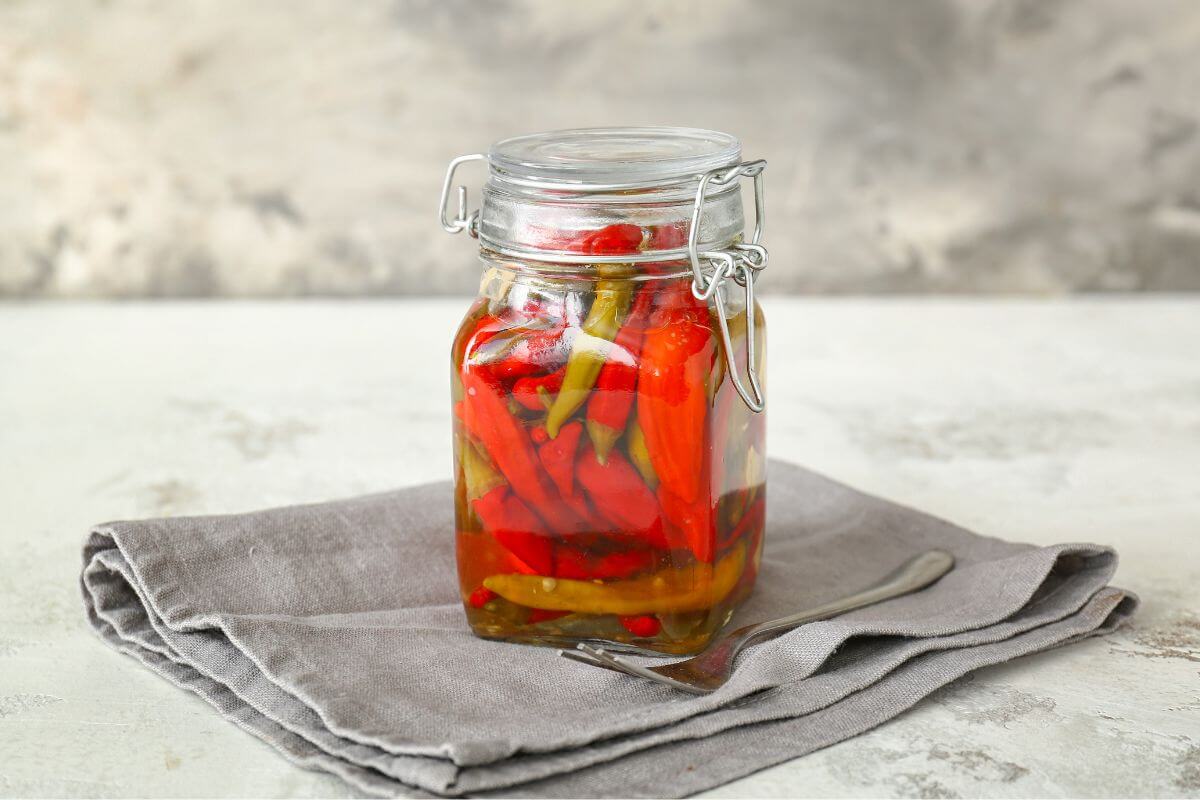 The image shows a canned chili with a fork and fabric which means a simple way to have a full meal with protein and fiber and one of the easiest ways to make a hearty meal on a budget.