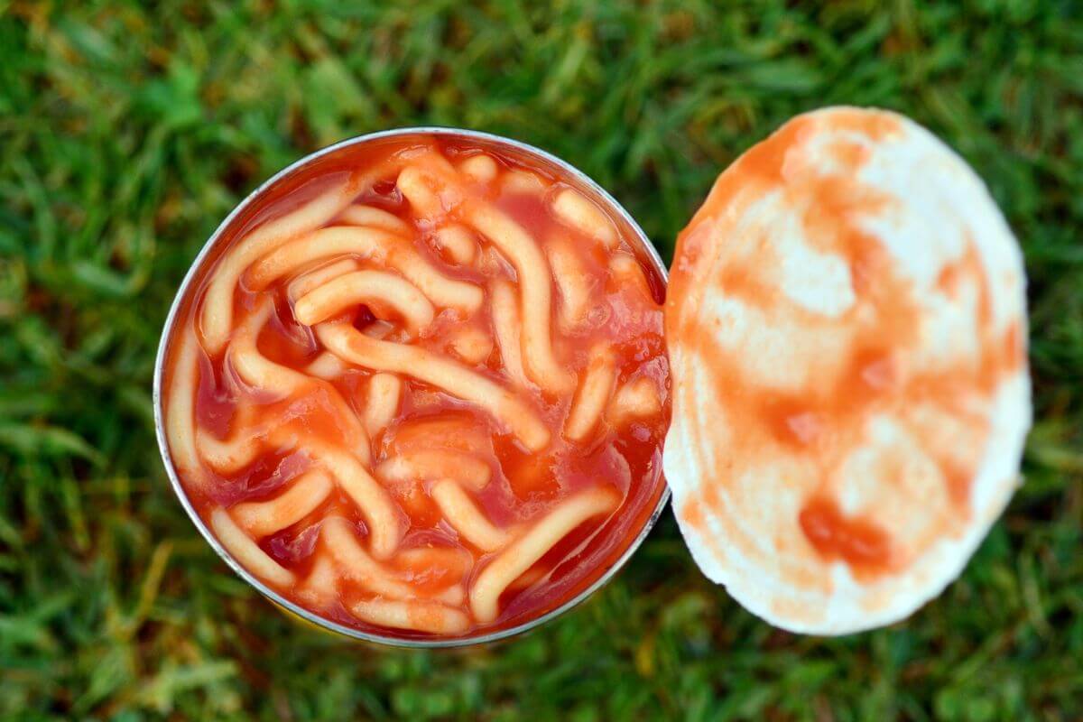 The image shows a canned spaghetti is one of the easiest meals to keep in the pantry and a simple way to stretch a grocery budget without sacrificing convenience.