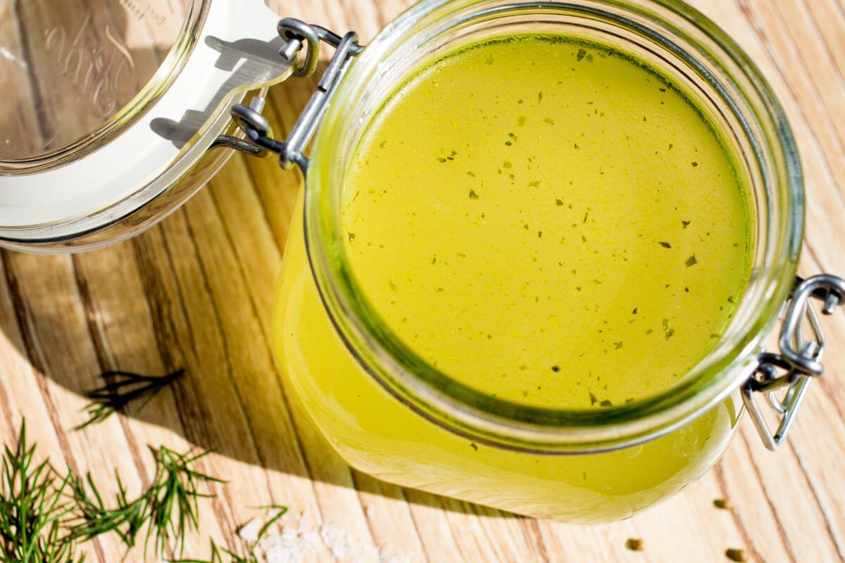The image shows canned broth on the table which means it a cheaper than making homemade broth and lasts a long time.