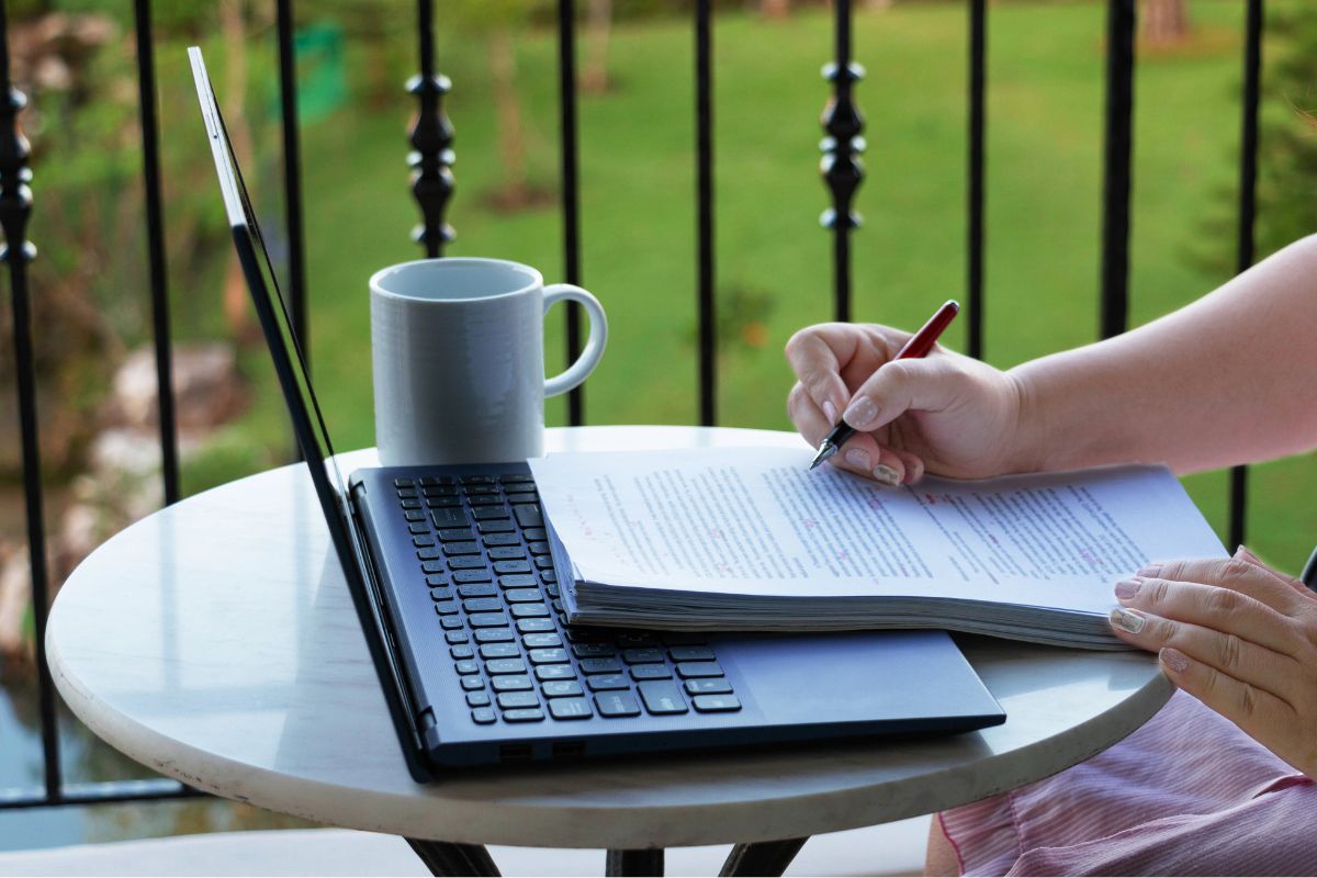 Image of a woman proofreading.