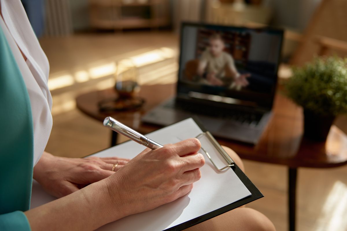 The picture of a woman doing online coaching.