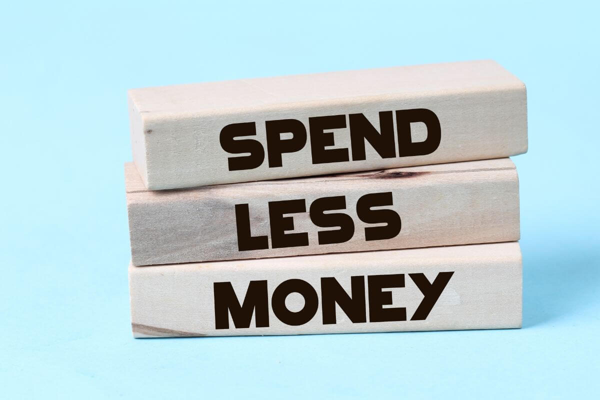 The picture shows a wooden rectangle with words that mean the meaning of no buy 2025 and how it works.