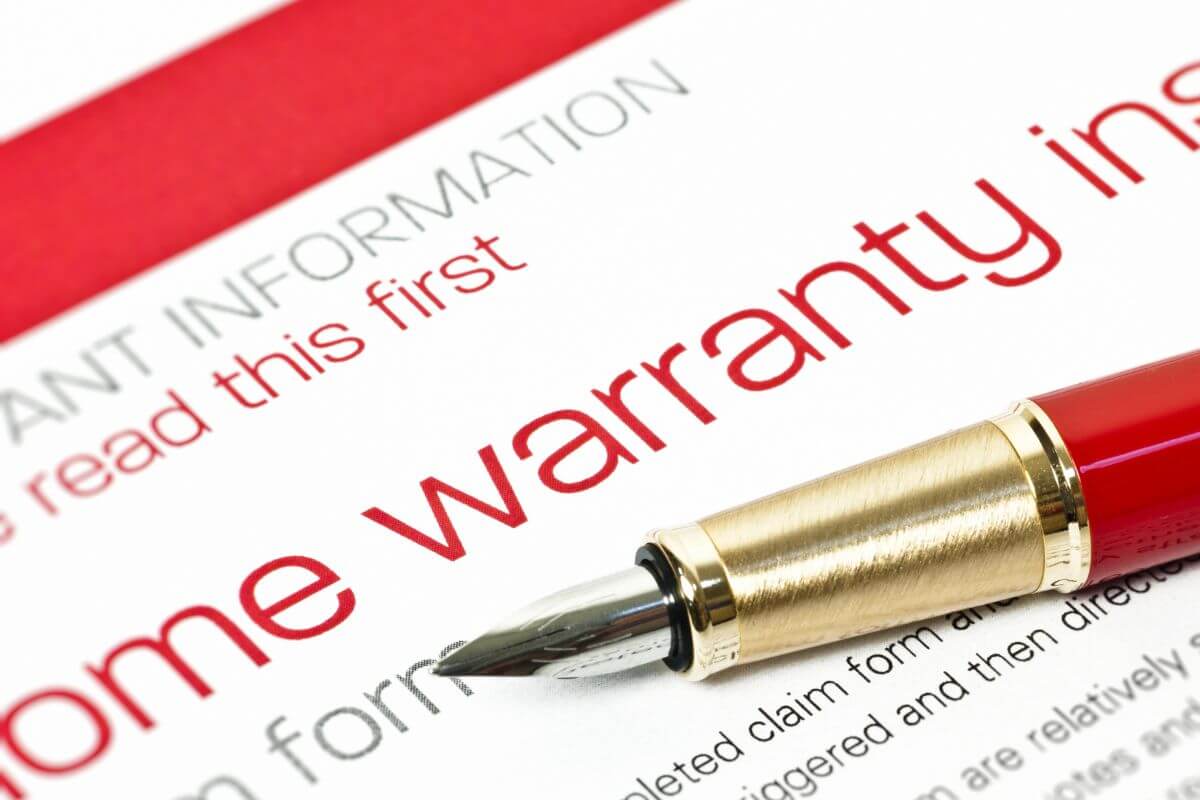 Image of a pen and paper with warranty.