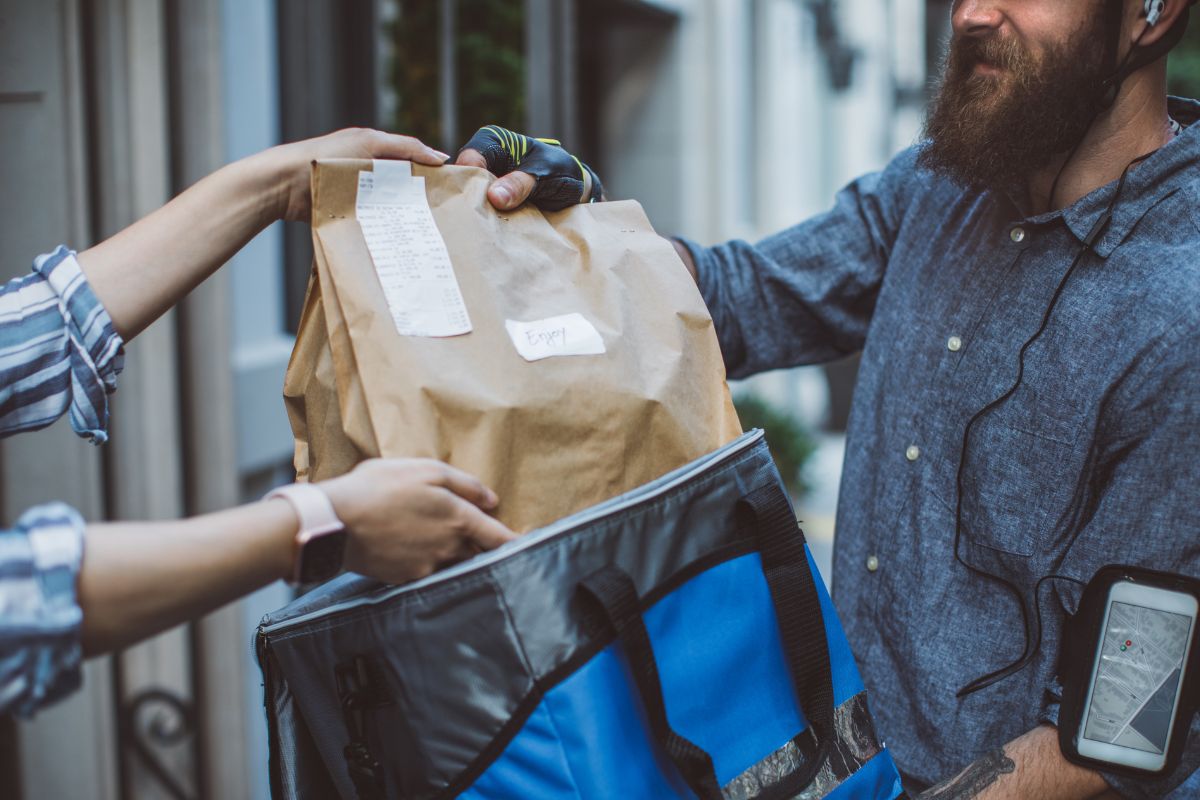 The photo of a delivery man working.