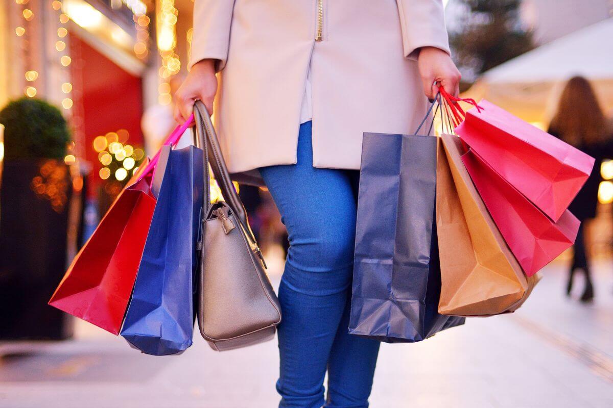 The image shows a woman with impulse purchases.
