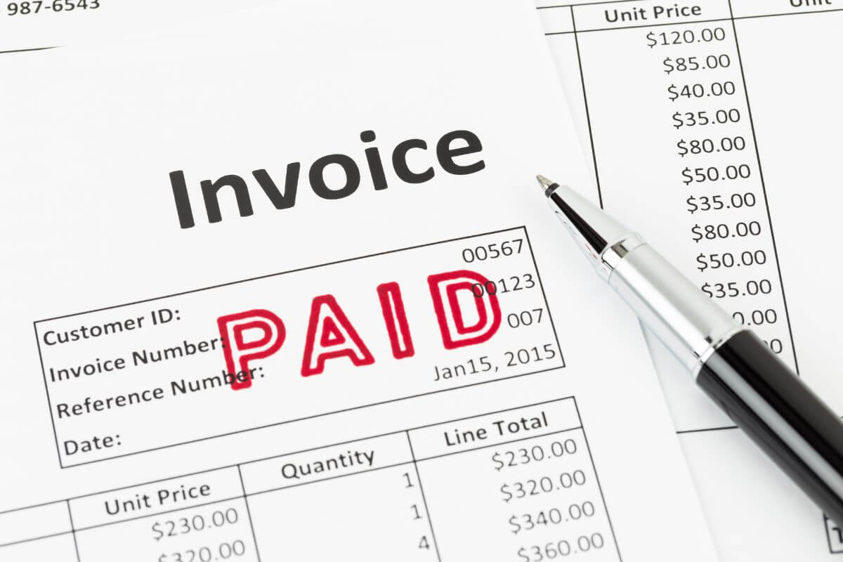 The picture tells about a pen and paper with notes and a red stump which means asking for goodwill adjustment can prevent damage to your credit score and could save you money in the long run.
