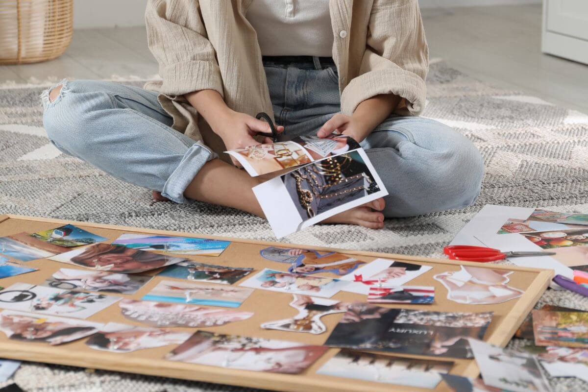 The picture of a board with photos and a girl cutting papers referring to visualize a debt-free future helps keep motivation strong and makes it easier to stay on track.