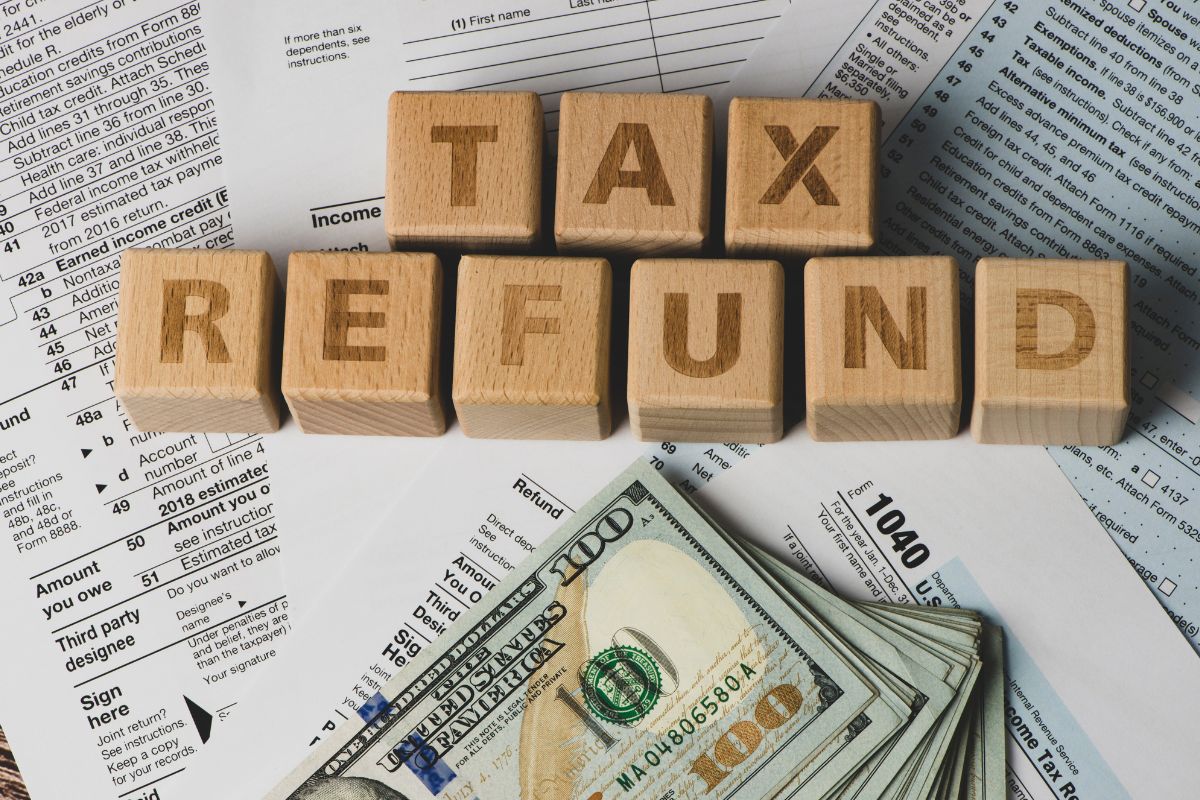 Picture of money and tax fund wording.