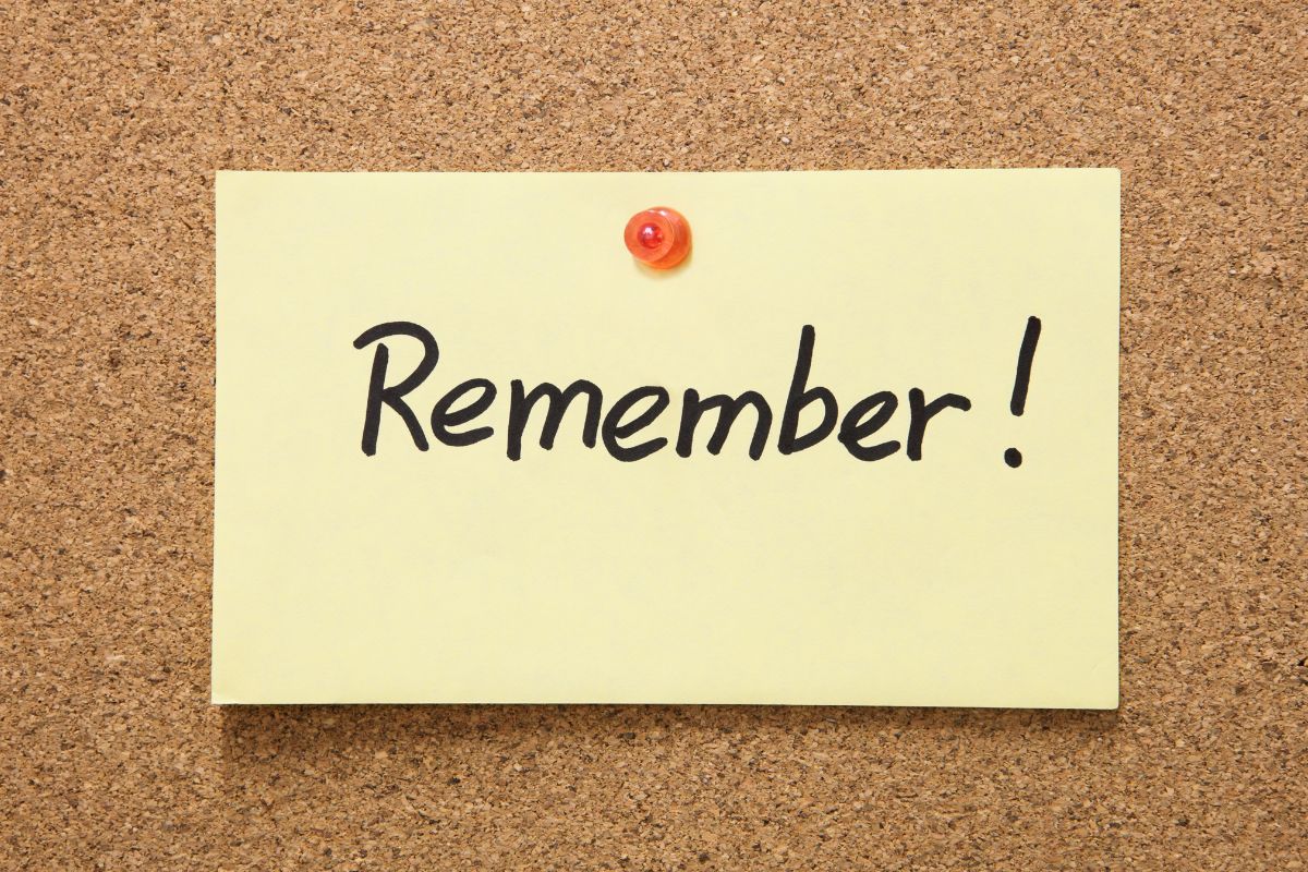 Image of a paper with remember written word.