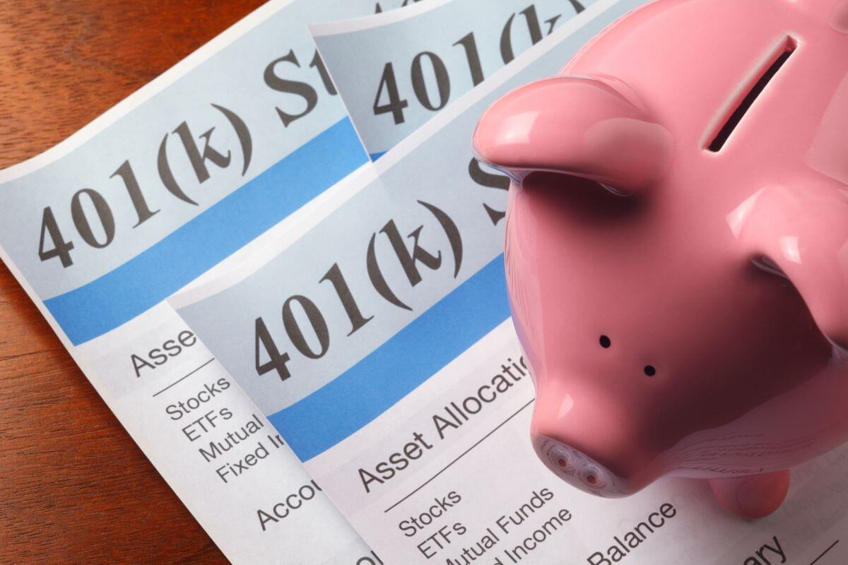 The image shows a piggy bank and paper with notes which means using tax-advantaged accounts helps you save for retirement and can make a huge difference in long-term savings.